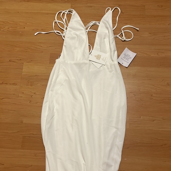 Brand new white halter gown with tie in back . Zipper in back with - Picture 10 of 15